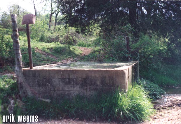 Tank below barn