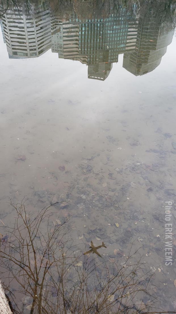 Relections of air plane for Reagan Airport in the Potomac River